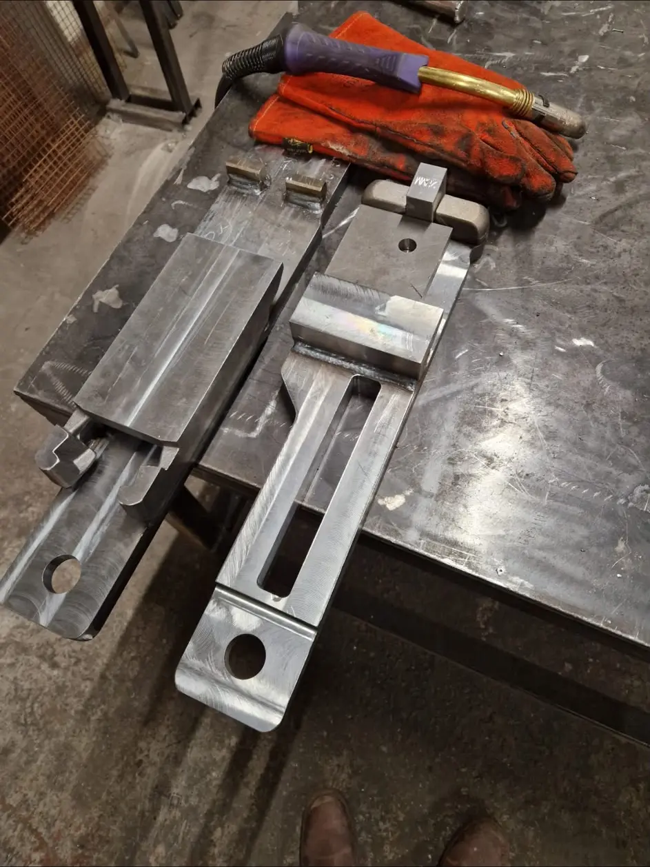Machined and fabricated steel components