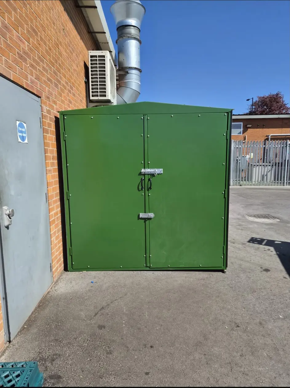 Finished green outdoor steel enclosure